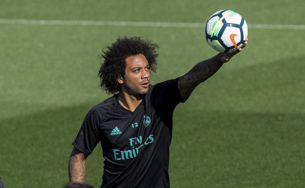 Marcelo, durante un entrenamiento con el Real Madrid. /Efe