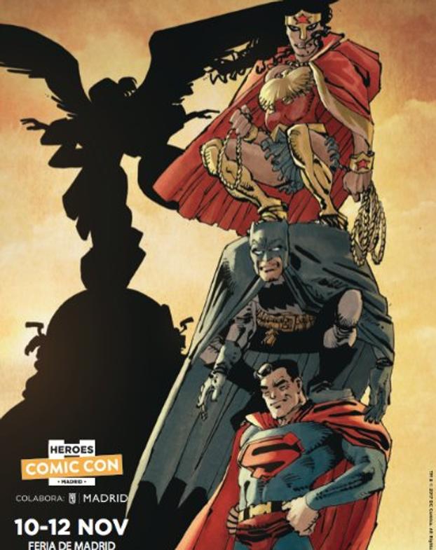 Cartel del Heroes Madrid Con dibujado por Frank Miller con el edificio madrileño Metropoli como fondo.