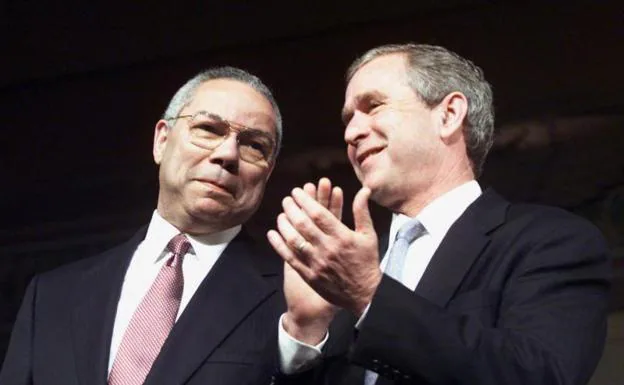 Colin Powell and George W. Bush. 