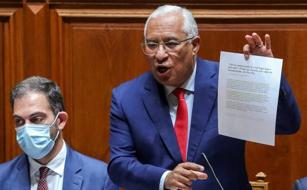 Costa shows a document during his speech before the Assembly.