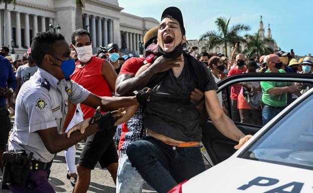A man is arrested during the protests that took place last summer in Havana.