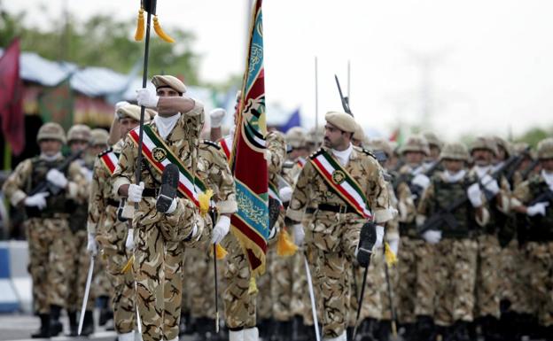 Iranian soldiers take part in a parade in Tehran.