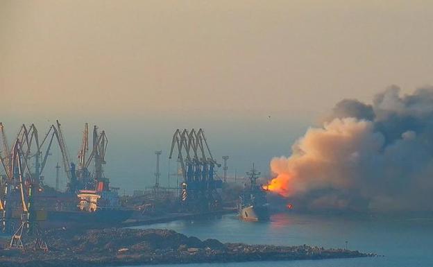   A Russian ship burns after being bombed in the port of Odessa. 