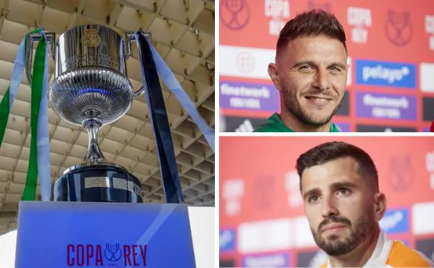 The captains of Betis and Valencia, Joaquín and Gayá, together with the Cup trophy.