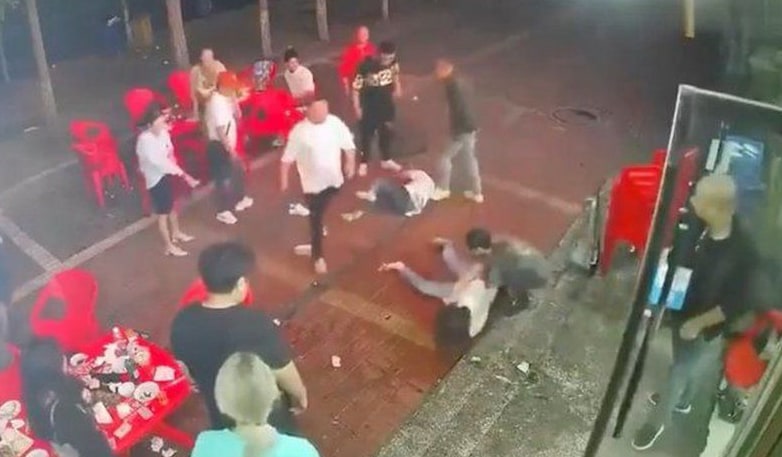 Image of the attack by a group of men on several women in a restaurant in Tangshan last month.