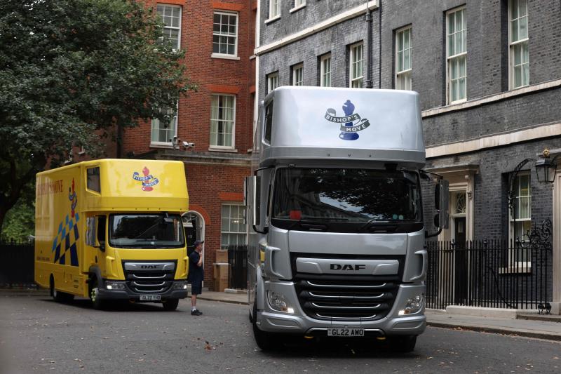 Unusual image of moving trucks in front of 10 Downing Street