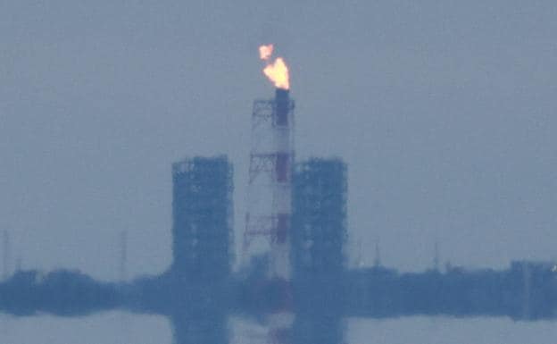 An image captures a flare at a new liquefied gas facility near the Finnish border.