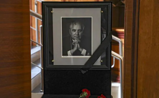 Flowers laid in front of a portrait of the late former Soviet President Mikhail Gorbachev in his office at the Gorbachev Foundation headquarters in Moscow.
