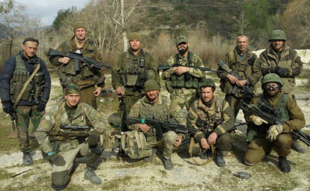 Photograph of alleged Russian mercenaries distributed by Amaq, the Islamic State's propaganda apparatus. 