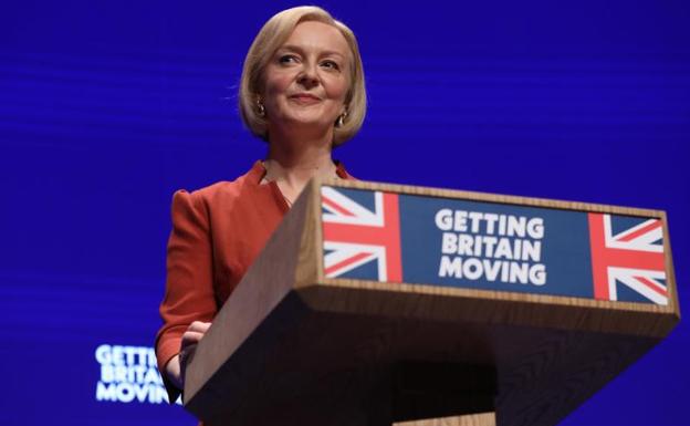 British Prime Minister Liz Truss delivers her opening speech at the Conservative Party conference in Birmingham. 